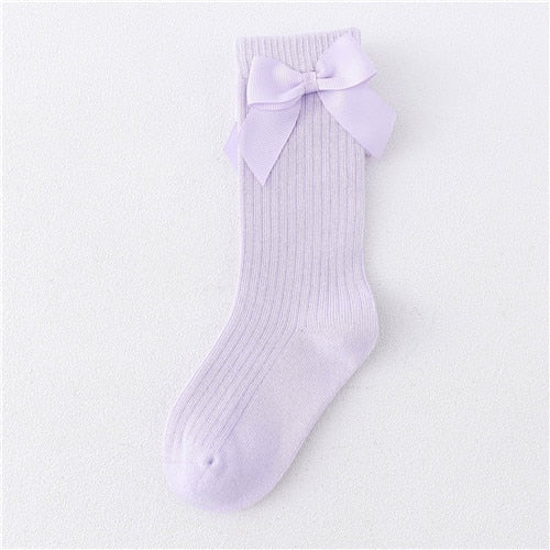 Seasonal Elegance: Delicate Bow Adorned Knee High Socks for Girls